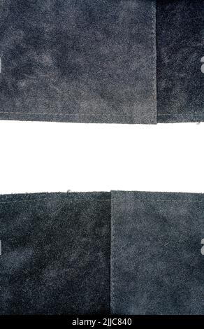 Two pieces of dark blue leather with a space for text isolated on white background. Stock Photo