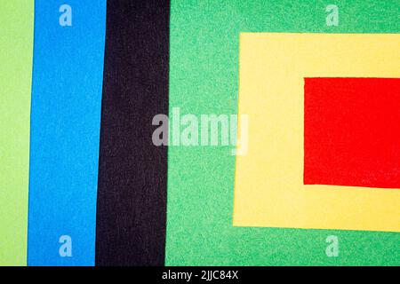 Multicolor background from a paper of different colors. Abstract colorful vibrant paper textures. Stock Photo