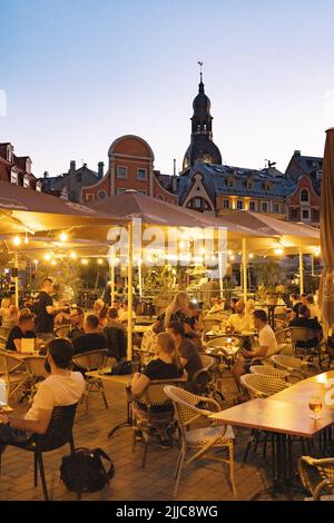 Riga bar; people drinking in bars and cafes at night, Riga Old Town, Riga Latvia Europe Stock Photo