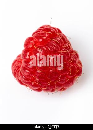 one berry Ripe raspberry with leaves isolated on white background Stock Photo