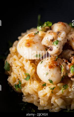 Cuttlefish risotto with garlic butter Stock Photo - Alamy
