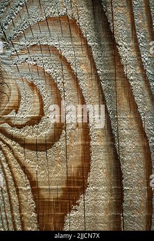 Close-up view of textured wooden surface with natural patterns and grain detail Stock Photo