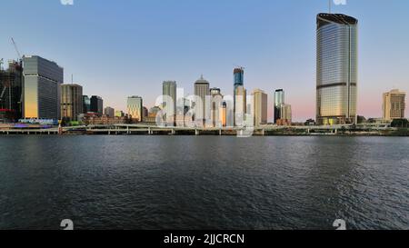 100 Skyscrapers at sunset seen from across the river. Brisbane CBD-Australia. Stock Photo