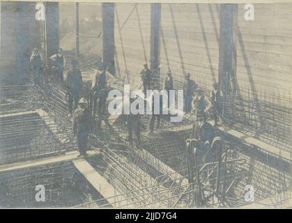 Construction of the carbon containers of Újhegyi coal washer. Construction of coal containers at the coal-washery in Újhegy. The Local History Collection of Csorba Gyz Könyvtár Library has been collecting photos and postcards related to Baranya County since January 1966. According to the data updated on 1st February 2016, the collection consists of 11,565 copies. As the result of the digitisation project that started in 2012, the Collection includes about 59,000 black-and-white and coloured records of different sizes and types, which are searchable through the electronic catalogue. Stock Photo