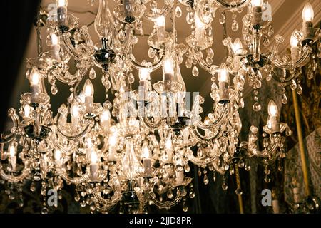 Close-up, old vintage chandelier with many details. Stock Photo
