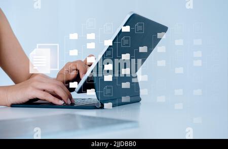 Document management. Cloud computing technology. Document file information and folder icons and person using tablet computer, online digital databases Stock Photo