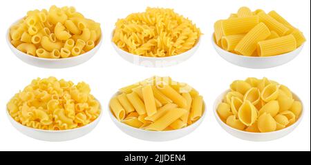 Uncooked dried conchiglie in ceramic bowl. Raw organic shell pasta isolated on white bachground with clipping path and full depth of field Stock Photo