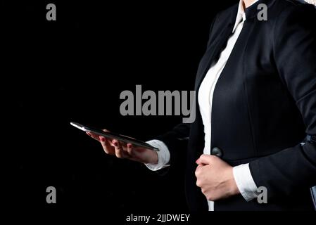 Businesswoman Holding Tablet And Presenting Important Message. Stock Photo