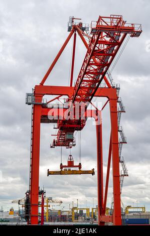 Dublin, Ireland- July 7, 2022: A shipping container crane in Dublin Port Stock Photo