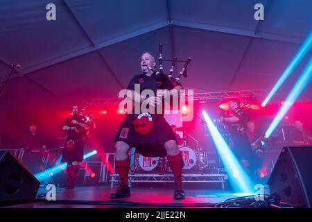 22 July 2022. Fochabers, Moray, Scotland. This is the Red Hot Chilli Pipers playing at the 2022 Speyfest on Friday night. Stock Photo