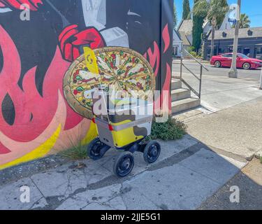 Los Angeles, CA, USA – June 26, 2022: A Serve Robotics robot makes a food delivery in Los Angeles, CA.
