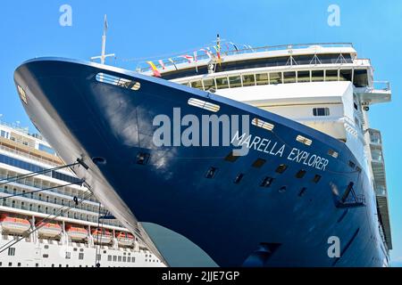 Corfu, Greece - June 2022: Close up view of the bow of the TUI cruise ship Marella Explorer moored in the commercial port of Corfu town. Stock Photo