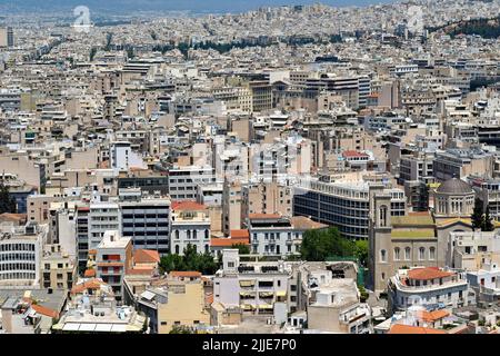 Athens, Greece - May 2022: Aerial view of homes and buildings in the city centre. Stock Photo