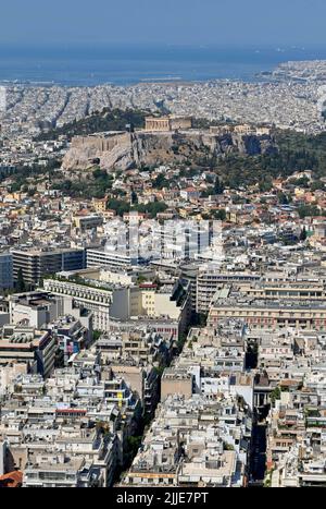 Athens, Greece - May 2022: Aerial view looking towards the port  of Piraeus, which is behind The Acroplis Stock Photo