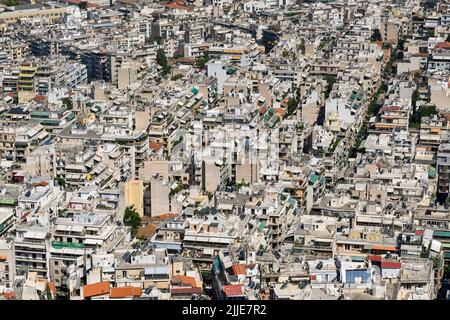 Athens, Greece - May 2022: Aerial view of homes and buildings packed tightly together in the city centre Stock Photo