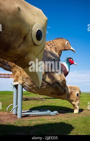 Regent, ND, USA - Jun 19, 2022: Pheasants on the Prairie is 1 of 8 scrap metal sculptures constructed along the 32-mile Enchanted Highway. The collect Stock Photo