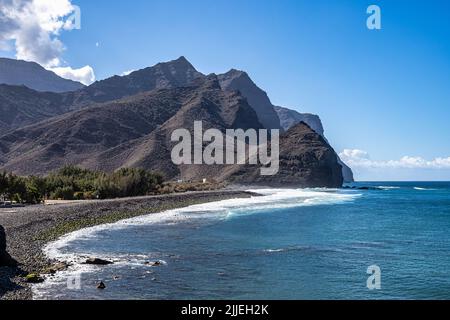 View of the port and beach Puerto de la Aldea of the Village of San Nicolas in Gran Canaria in Spain Stock Photo