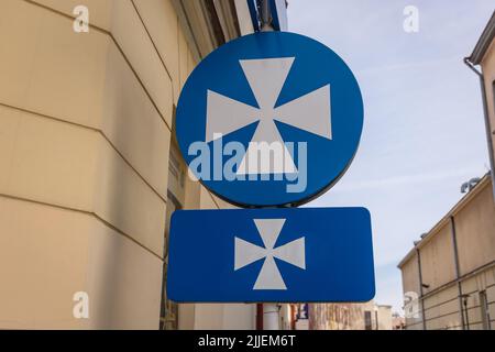 Back of road signs with city Coat of arms on Grunwaldzka Street in Old Town of Rzeszow, southeastern Poland, capital of Subcarpathian Voivodeship Stock Photo