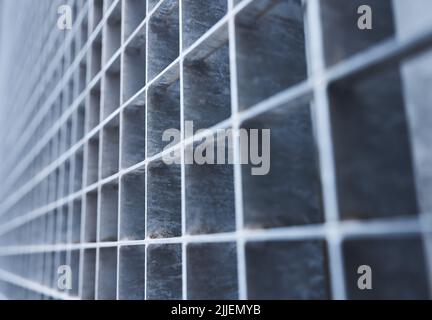 detail of a metallic surface with rectangular cells Stock Photo