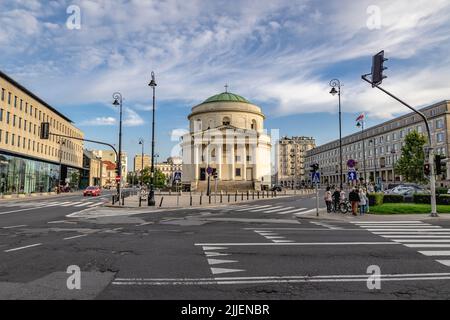 Saint Alexander Church on a Three Crosses Square in Warsaw, capital of Poland, Ministry of Economic Development on the right side Stock Photo