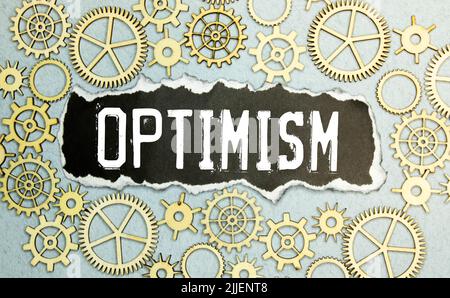 Optimism Word Written In Wooden Cube Stock Photo