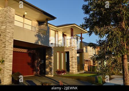 Suburban homes in the afternoon sunshine Stock Photo