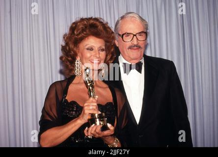 Sophia Loren and Gregory Peck at the 63rd Academy Awards ceremony on ...