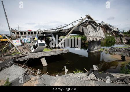 Irpin, Ukraine. 12th July, 2022. A bridge across the Irpin River was destroyed by the Ukrainian army to stop the advance of Russian troops from advancing to Kyiv. This bridge was the only way out for people from the occupied cities of Kyiv region. Russia invaded Ukraine on February 24, 2022. (Credit Image: © Oleksii Chumachenko/SOPA Images via ZUMA Press Wire) Stock Photo