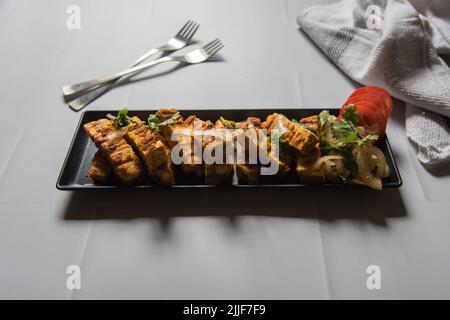Grilled paneer or cottage cheese cubes Stock Photo