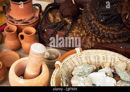 Ancient Roman cosmetics, retro perfume and vintage bath accessories. Reconstruction of events in the thermae of the Roman Empire Stock Photo