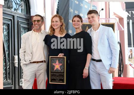 Los Angeles, USA. 25th July, 2022. LOS ANGELES - JUL 25: Leland Orser, Laura Linney, Jeanne Tripplehorn, August Tripplehorn Orser at the Laura Linney Star Ceremony on the Hollywood Walk of Fame on July 25, 2022 in Los Angeles, CA (Photo by Katrina Jordan/Sipa USA) Credit: Sipa USA/Alamy Live News Stock Photo