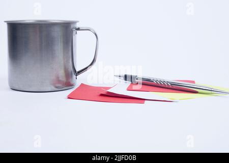 Blank Sticky Note With Laundry Clip Stack Of Colorful Paper Pen Placed On Table. Stock Photo