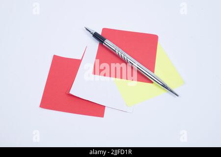 Blank Sticky Note With Laundry Clip Stack Of Colorful Paper Pen Placed On Table. Stock Photo
