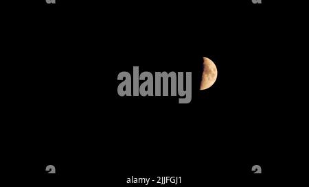 The growing moon in the night sky. Copy space area. Background Stock Photo