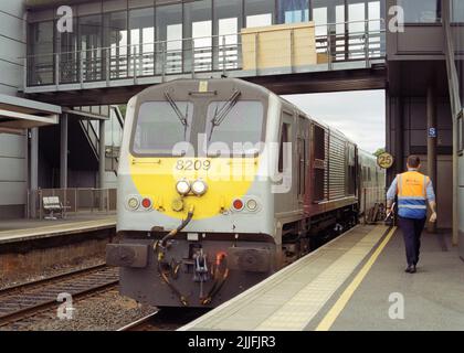 Portadown, UK - 4 July 2022: A inter-city passenger train (Enterprise) is arriving Portadown station. Stock Photo