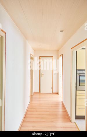 Empty bright narrow hallway or hallway in an apartment Stock Photo
