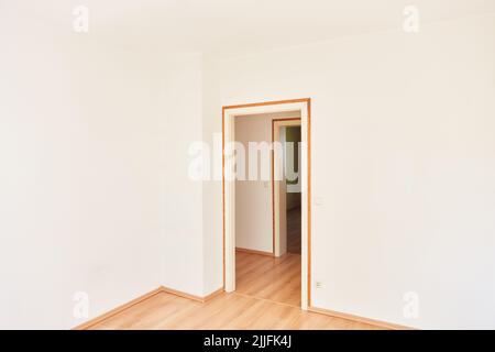Corner of the room in an empty bright room of an apartment Stock Photo