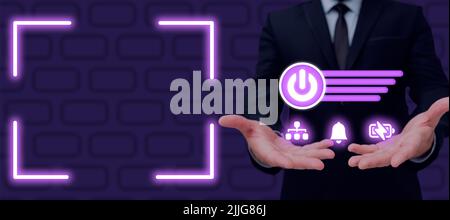 Businessman Displaying Power Button, Battery, Notification, And Network System S In Futuristic Design. Man In Suit Holding Symbols On Hand With Stock Photo
