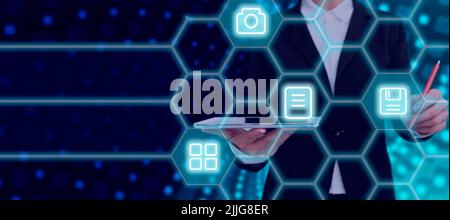 Businesswoman With Tablet And Pen Pointing On Digital S In A Futuristic Pattern Design And Presenting Important Information. Woman Displaying Symbols Stock Photo