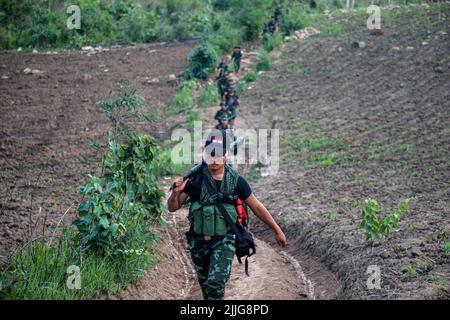 A Karenni Nationalities Defence Force (KNDF) soldier is on guard during ...