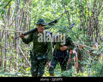 A Karenni Nationalities Defence Force (KNDF) soldier is on guard during ...