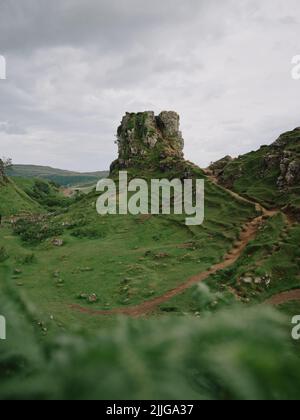 The Fairy Glen & Castle Ewen tourist spot in the hills above the village of Uig, Isle of Skye Scotland. A strange green basalt & landslip landscape Stock Photo