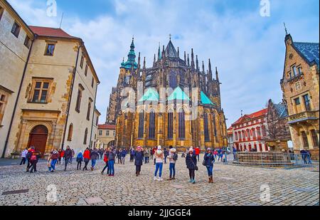 PRAGUE, CAZECH REPUBLIC - MARCH 6, 2022: The Third Courtyard of Prague Castle or St George Square with a view on the apse of St Vitus Cathedral, on Ma Stock Photo