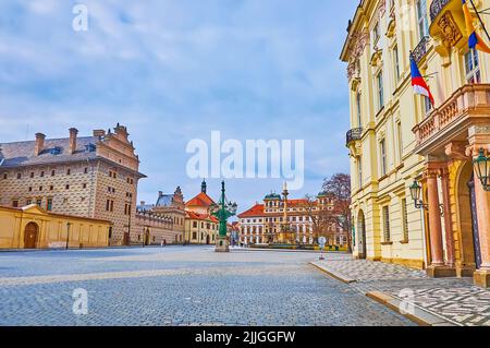 Historic palaces, decorated with sgraffito, moulding and sculptures on the Castle Square of Hradcany, Prague, Czech Republic Stock Photo