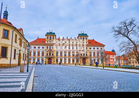 The facade of historic Baroque Tuscany Palace, seen from the Castle Square (Hradcanske Namesti), Hradcany, Prague, Czech Republic Stock Photo