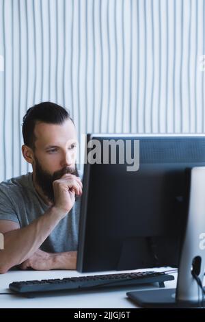 professional career pensive it engineer task Stock Photo