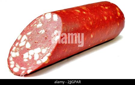 Servelat salami with large fat half on a white background Stock Photo