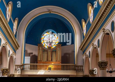 The nave and organ loft of the Cathedral of the Immaculate Conception or Iquique Cathedral in Iquique, Chile. Stock Photo