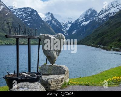 Picnic area Yrineset, art objects at lake Oldevatn, view to valley Briksdalen, Norway Stock Photo