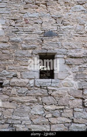 Massive stone wall background. Old castle rock wall. Stock Photo